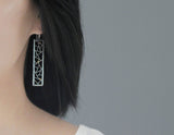 Girl wearing Bird Kiragami Earring - Lotus Fun